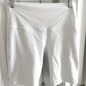 White Lululemon shorts bike